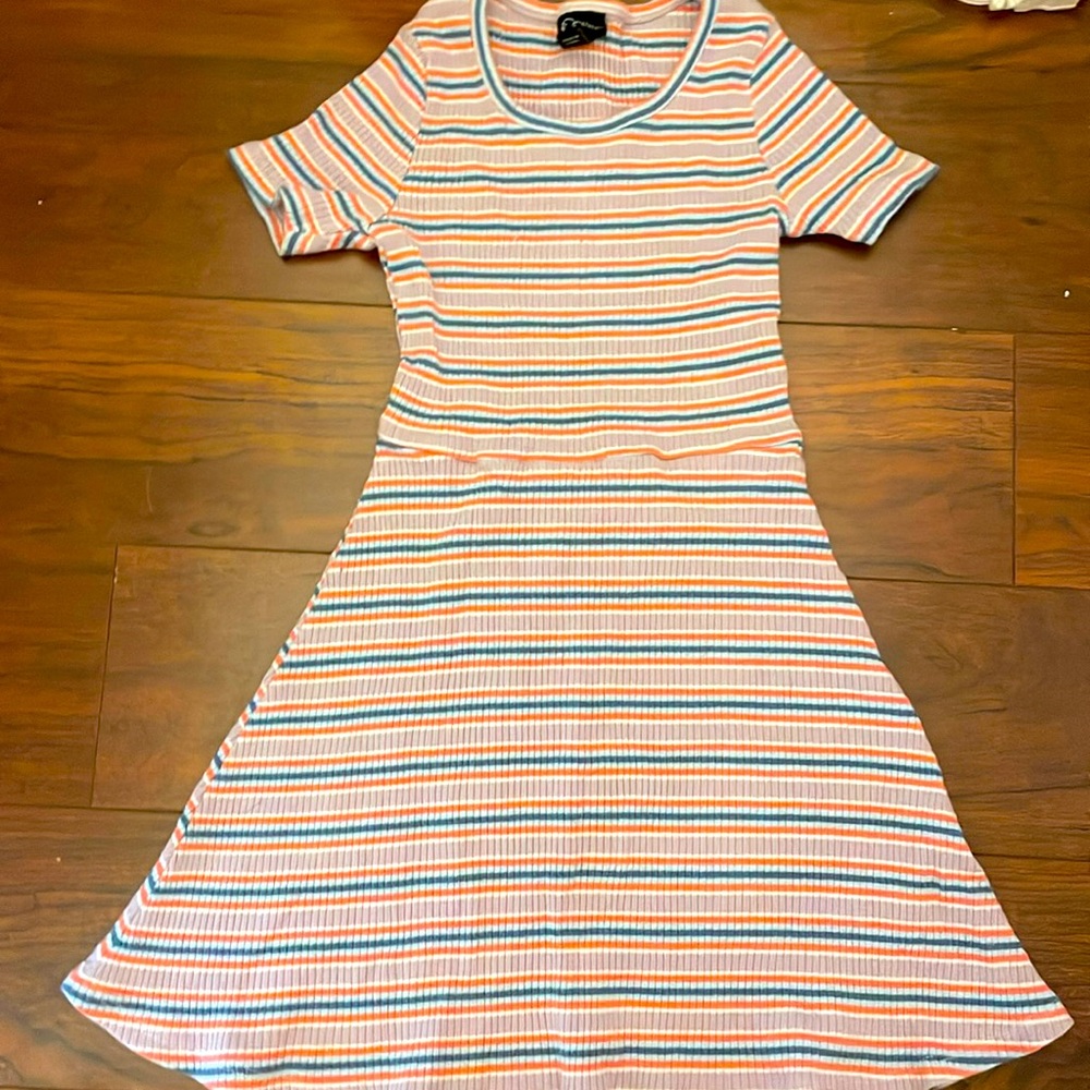 Long dress, short sleeve, different colors, soft inside and out, has ruffles,